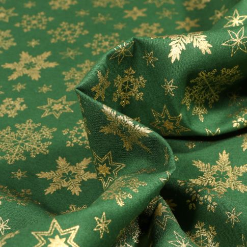 Tissu Coton imprimé Flocons des neiges dorés sur fond Vert