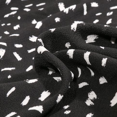 Tissu Crêpe Georgette Denisa sur fond Noir