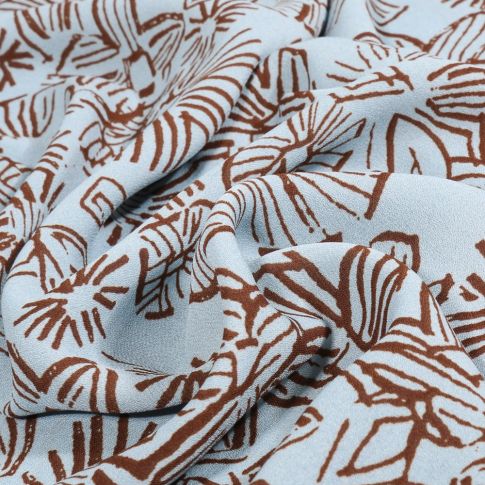 Tissu Crêpe Georgette Makao sur fond Bleu ciel