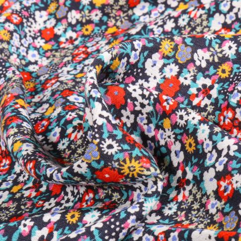 Tissu Crépon de viscose Sweet Flower Meyline sur fond Noir