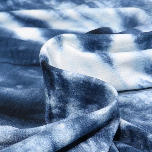 Tissu Jersey Viscose  Tye and dye sur fond Bleu