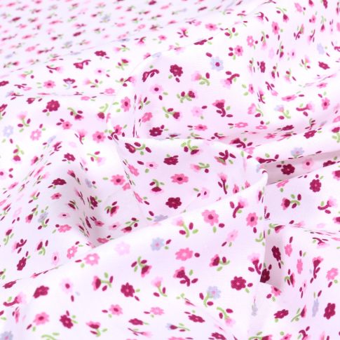 Tissu Coton imprimé Mille fleurs sur fond Blanc