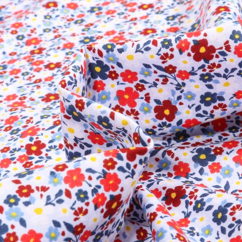 Tissu Coton imprimé Sweet Flower Charlyze sur fond Bleu ciel