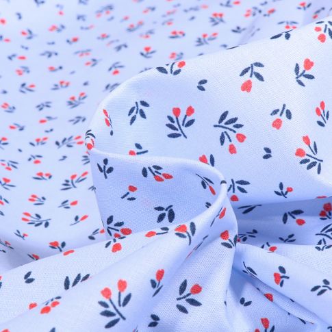 Tissu Coton imprimé Mallory sur fond Bleu ciel