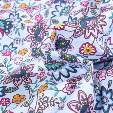 Tissu Coton imprimé Amaël sur fond Bleu ciel