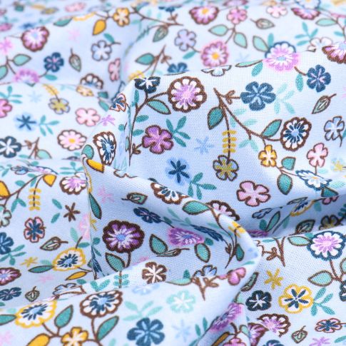 Tissu Coton imprimé LittleBird Stella sur fond Bleu ciel