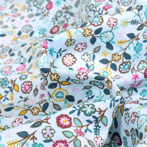 Tissu Coton imprimé LittleBird Stella sur fond Vert menthe clair