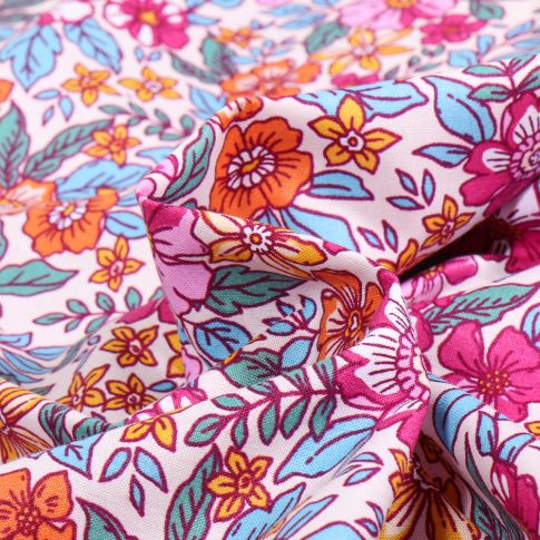 Tissu Coton imprimé Sweet Flower Noemy sur fond Rose pâle