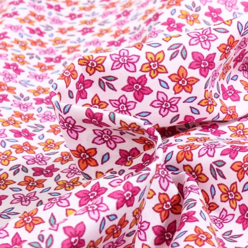 Tissu Coton imprimé Cali rose sur fond Blanc