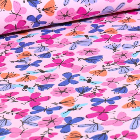 Tissu Jersey Coton Fleurs & papillons sur fond Rose pâle