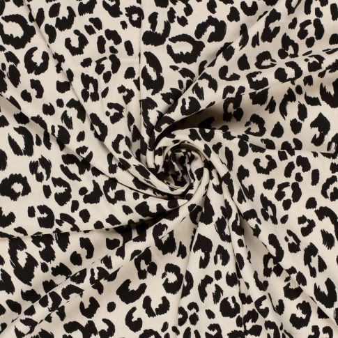 Tissu Jersey lycra imprimé léopard noir sur fond Beige