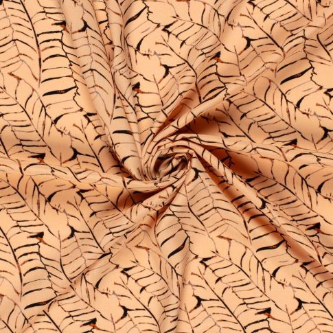 Tissu Popeline de Viscose imprimé Feuilles noires sur fond Saumon