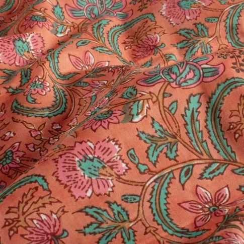 Tissu Voile de Coton Isadora fleurs roses sur fond Orange