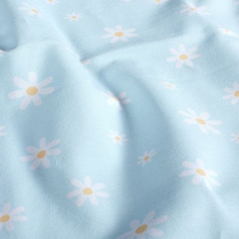 Tissu Jersey Coton Pâquerettes blanches et jaunes sur fond Bleu ciel