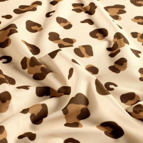 Tissu Lycra taches léopard Kaya marron sur fond Beige sable