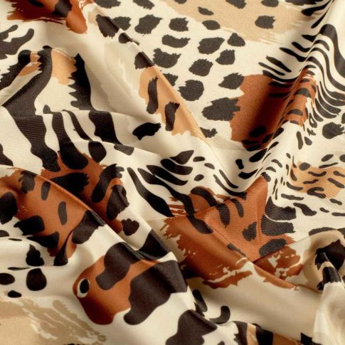 Tissu Lycra animalier Noma fauve sur fond Beige