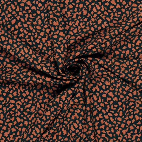 Tissu Crêpe de Viscose Séléné moucheté Rouille sur fond Noir