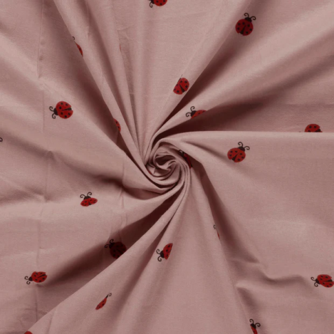 Tissu Flanelle de Coton Léonie coccinelles Rouges sur fond Rose poudré