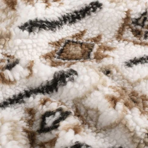Tissu Fausse fourrure Mouton Sierra motif aztèque sur fond Blanc cassé