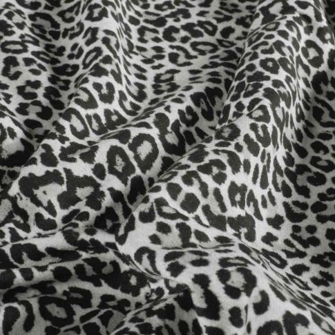 Tissu Sweat léger French Terry Maïa extensible léopard Noir sur fond Blanc