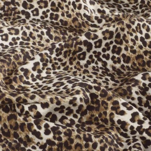Tissu Sweat léger French Terry Alya extensible léopard Brun et Noir sur fond Beige sable