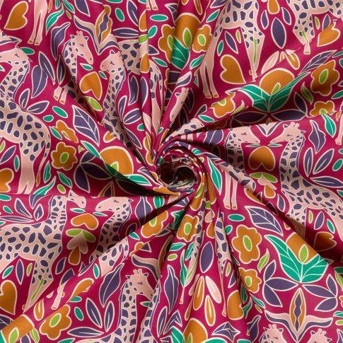 Tissu Popeline de Coton imprimé Girafes fleuris sur fond Framboise