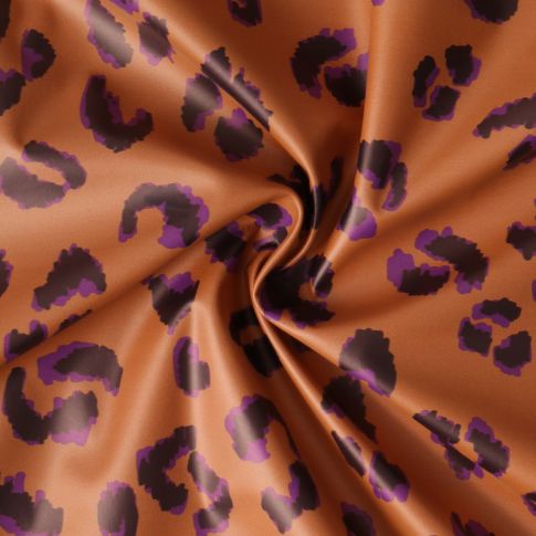 Tissu Imperméable Savannah Pop léopard Violet sur fond Terracotta