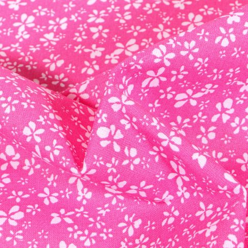 Tissu Coton imprimé Arty Petites fleurs blanches sur fond Rose bonbon