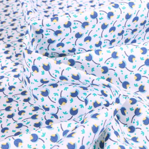 Tissu Coton imprimé Arty Divy bleu sur fond Blanc