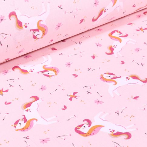 Tissu Coton imprimé Arty Licornes et petites fleurs sur fond Rose pastel