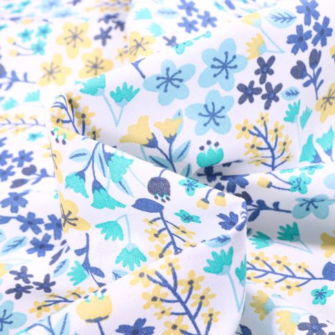Tissu Coton imprimé Arty Milly bleu sur fond Blanc