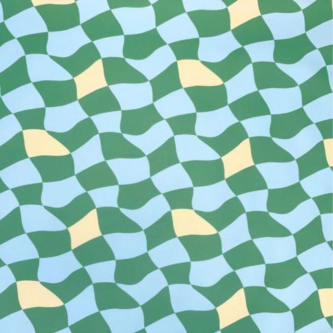Tissu Imperméable déperlant Damino vert sur fond Bleu