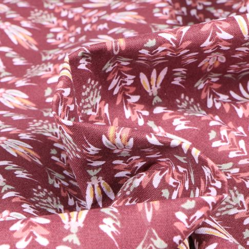 Tissu Coton imprimé Arty Dezo sur fond Lie de vin