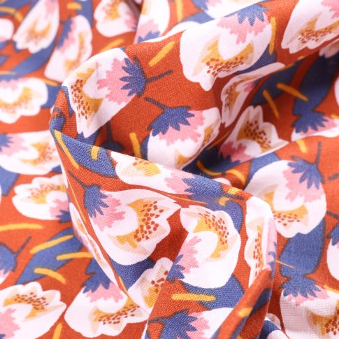 Tissu Coton imprimé Arty Dimeo sur fond Rouille