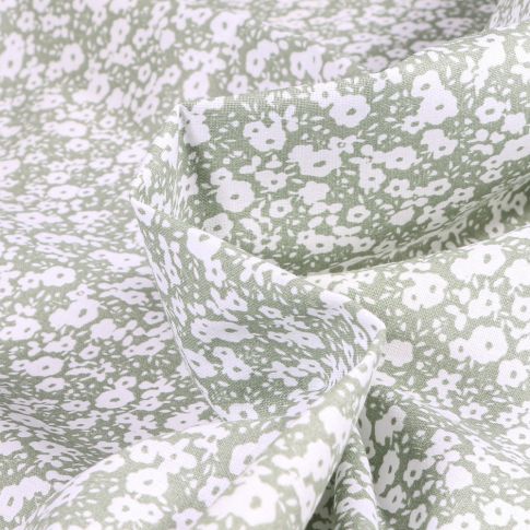 Tissu Coton imprimé Arty Hilali sur fond Vert d'eau
