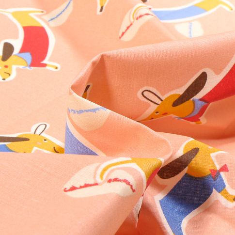 Tissu Coton enduit Hot Dog sur fond Pêche