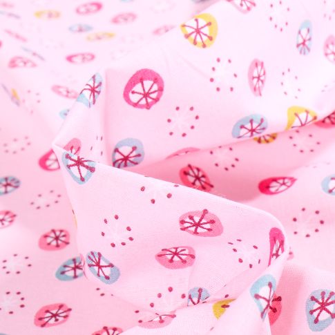 Tissu Coton imprimé Arty Cercles fleuris sur fond Rose