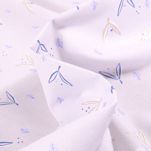 Tissu Coton imprimé Arty Jayden dorés sur fond Blanc