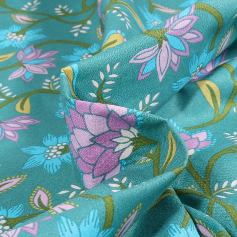 Tissu Coton imprimé Arty Kalia sur fond Bleu turquoise