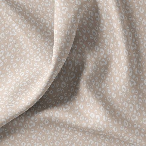 Tissu Coton imprimé léopard Kamar blanc sur fond Beige sable