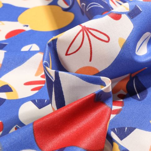 Tissu Coton enduit Nashi sur fond Bleu