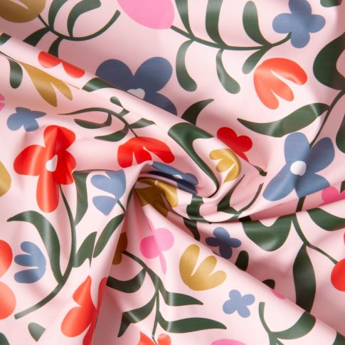 Tissu Imperméable imprimé Fleuris Pamel sur fond Rose clair