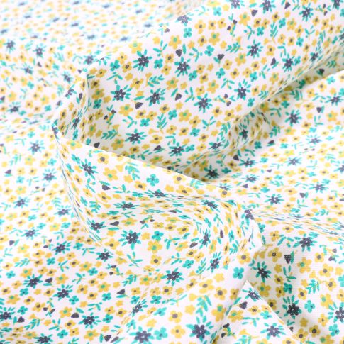 Tissu Coton imprimé Arty Pio vert sur fond Blanc