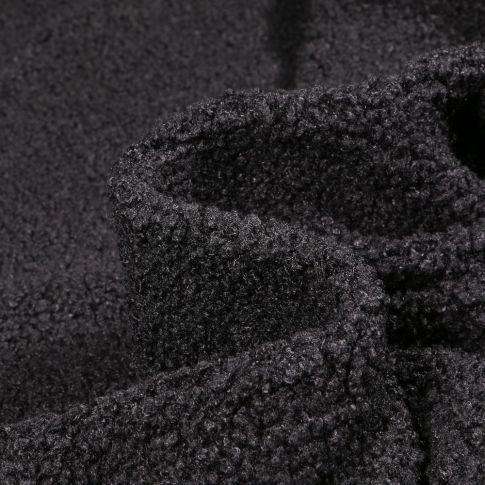 Tissu Fausse fourrure Teddy Bouclettes sur fond Noir