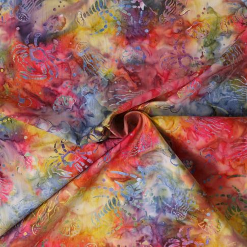 Tissu Coton imprimé Batik Aquaflow sur fond Rouge