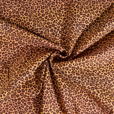 Tissu Popeline de Coton Léopard sur fond Ocre
