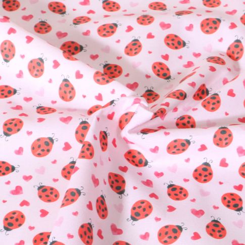 Tissu Coton imprimé Petite Chance animaux sur fond Rose pâle