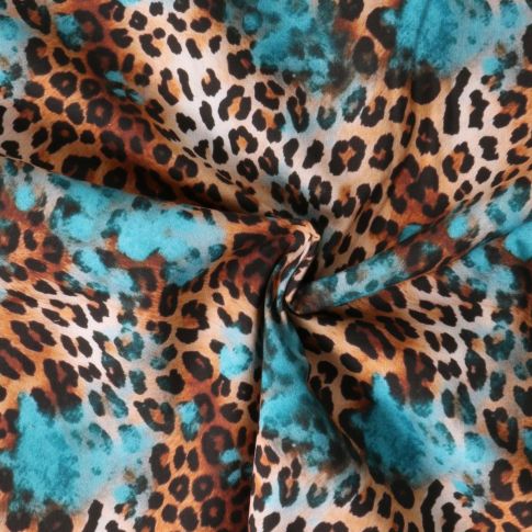 Tissu Coton imprimé  Savahona léopard sur fond Bleu turquoise