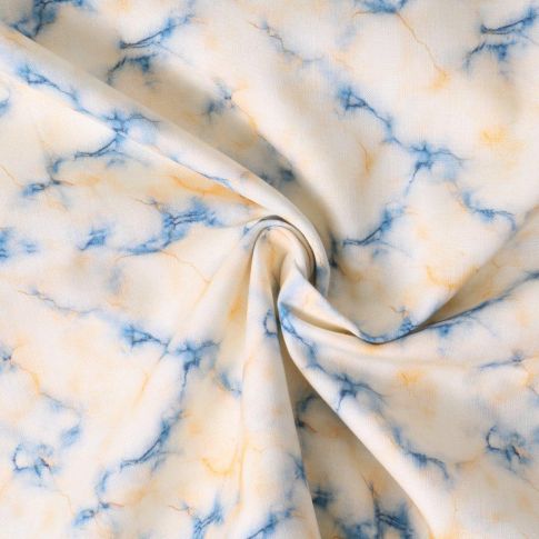 Tissu Coton imprimé  Auriane marbrures bleues sur fond Crème