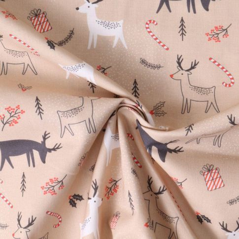 Tissu Coton imprimé  Nordikka rennes stylisés sur fond Beige sable